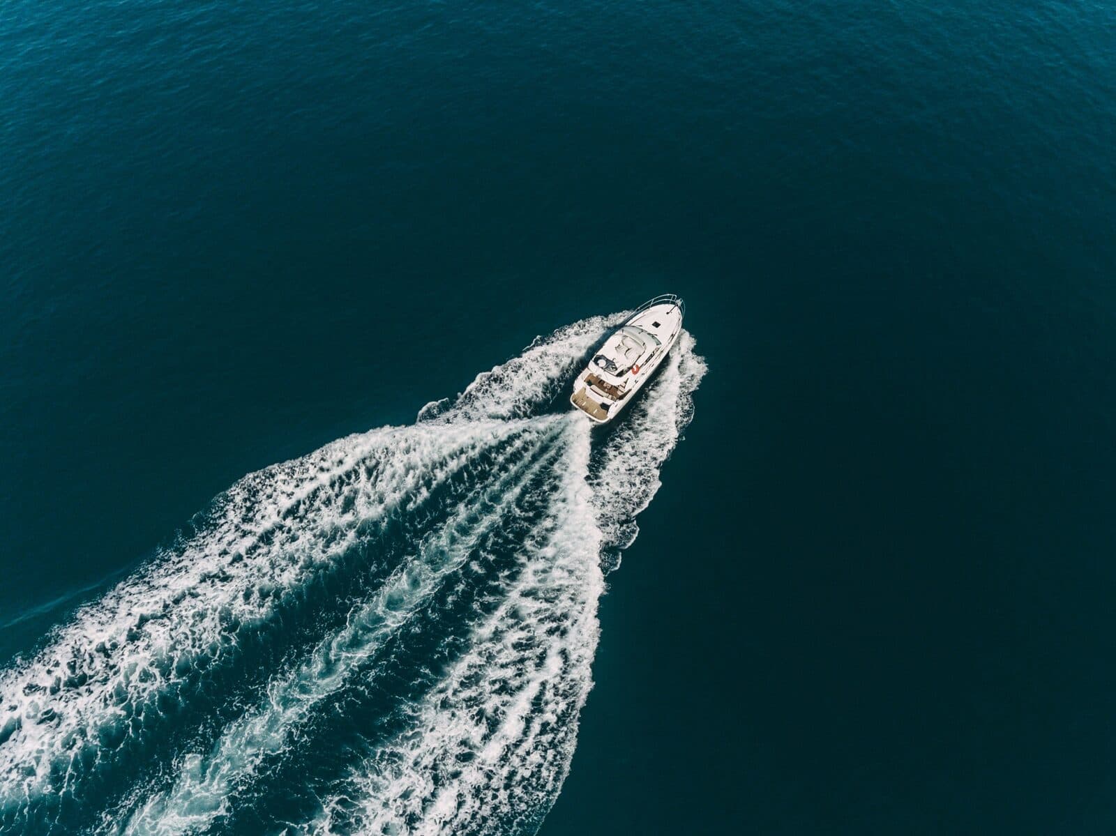 Aerial view of yacht on open Caribbean waters